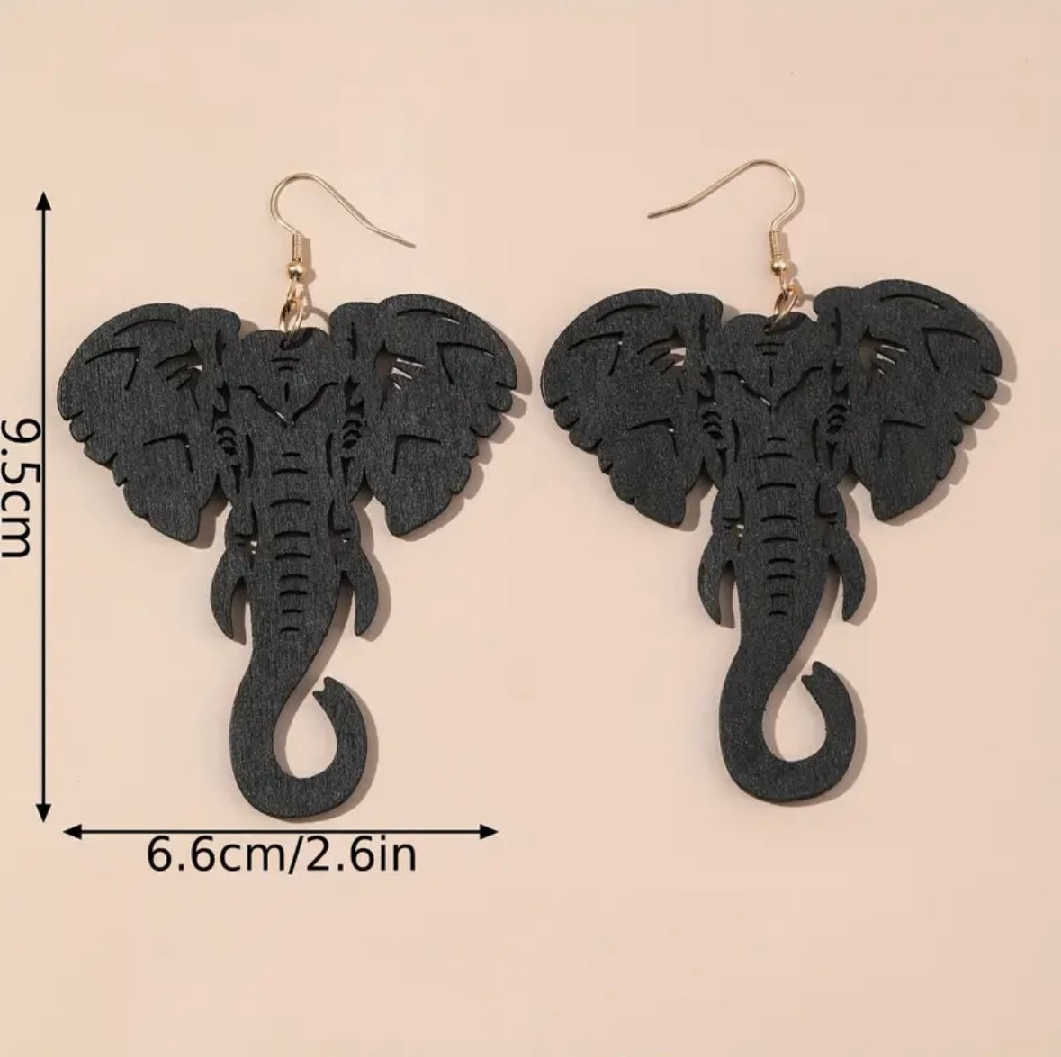 Unveil Your Boho Chic: Trendy 3.74" Wooden Elephant Head Earrings for a Playful Vacation Look!