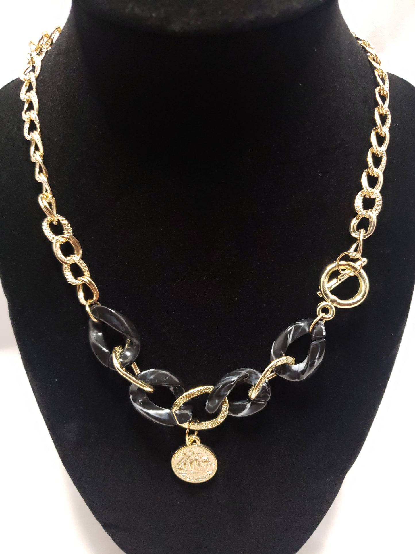 Black acrylic gold plated chain link necklace with coin pendant